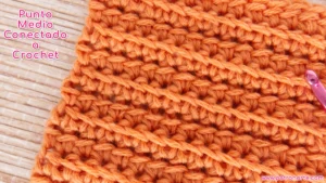 punto medio conectado de crochet